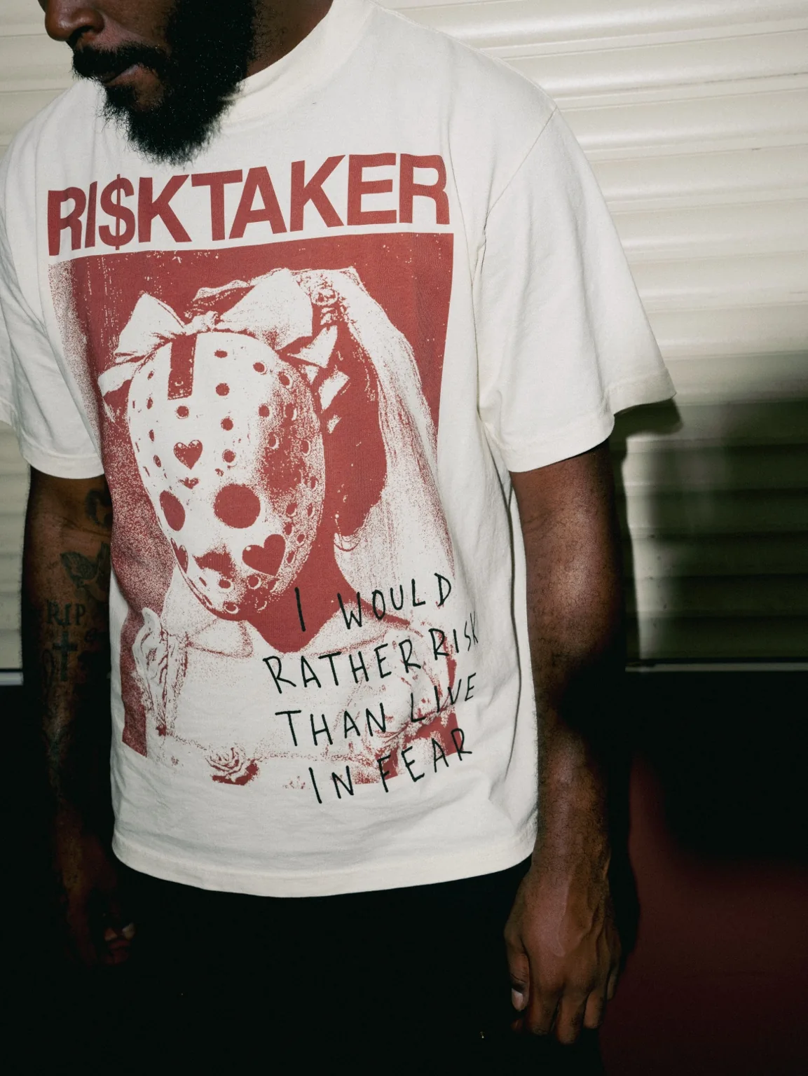 Close-up of the real Mask / Rather Risk Tee with unobstructed oxblood artwork